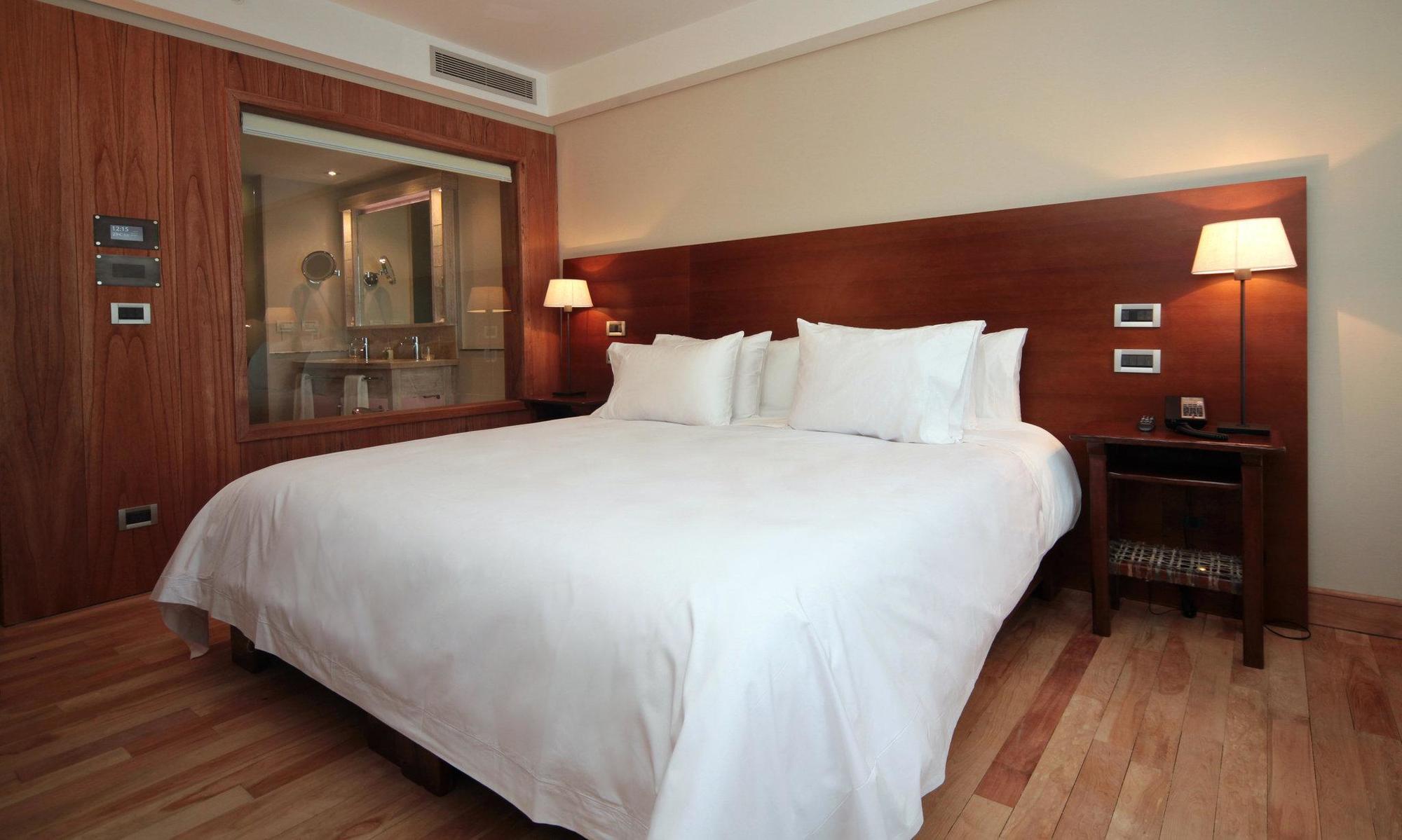 Arakur Ushuaia Resort & Spa Luaran gambar A bedroom at the hotel